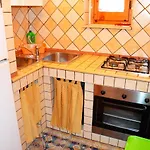 Apartamento Grazioso Piano Terra E Doppio Spazio Esterno Calaluna *